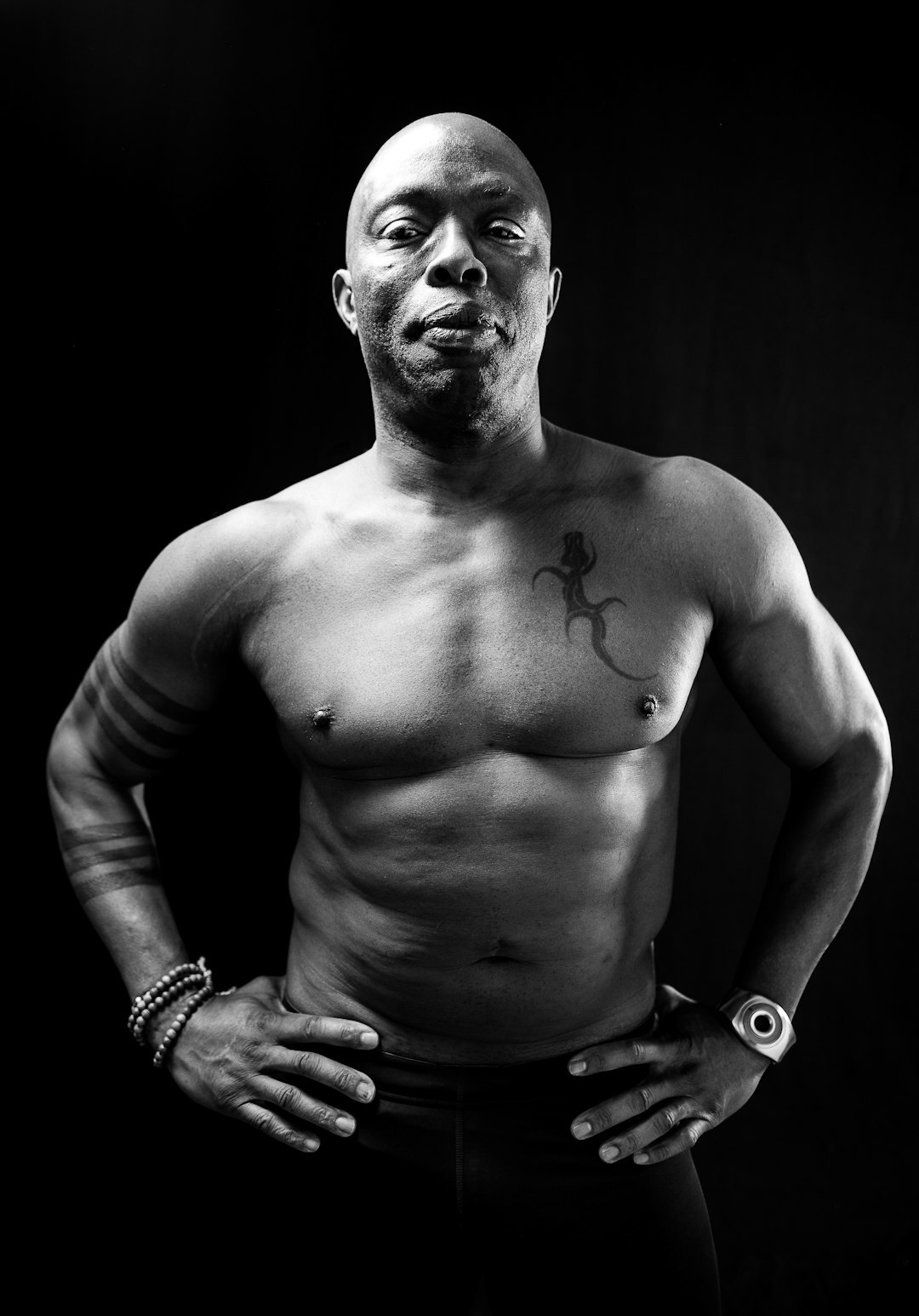 Studio portrait of a Black male media trainer in his forties